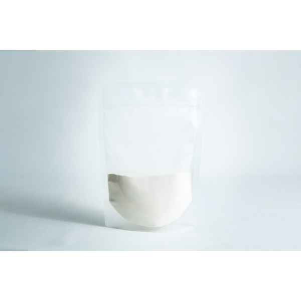 A clear resealable pouch, half-filled with Agar Mix MYAG Antibacterial Malt Extract Yeast powder, sits on a white surface against a light background.