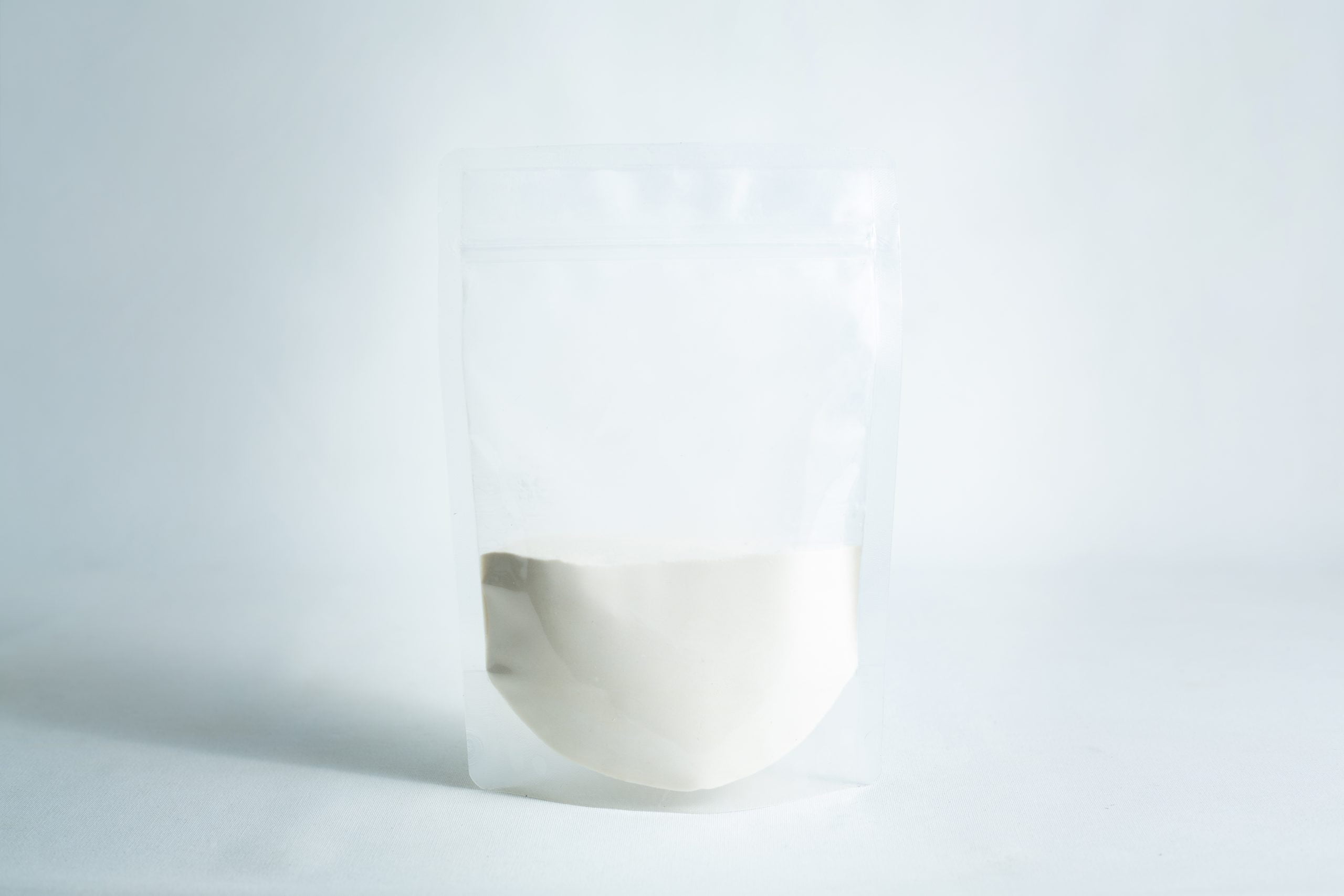 Agar Mix MEAG Antibacterial Malt Extract Agar 2 A clear resealable pouch, half-filled with Agar Mix MYAG Antibacterial Malt Extract Yeast powder, sits on a white surface against a light background.