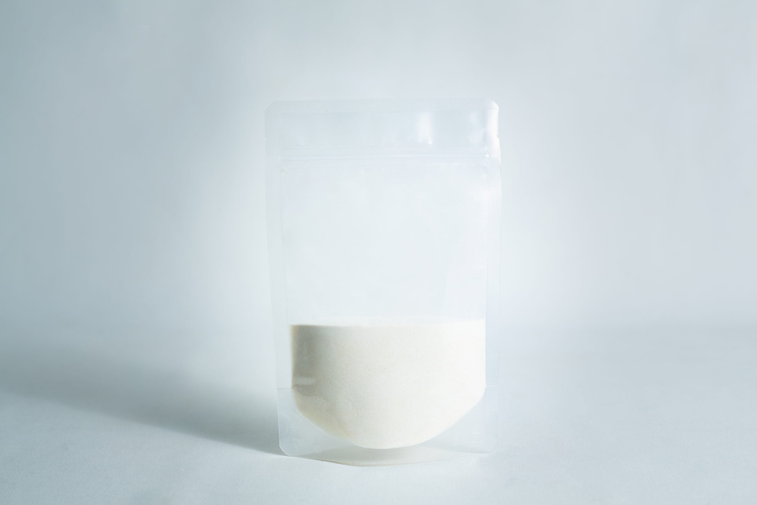 Agar Mix MYAG Antibacterial Malt Extract Yeast 1 A clear resealable pouch, filled halfway with Agar Mix MYAG Antibacterial Malt Extract Yeast white powder, set against a plain white background.