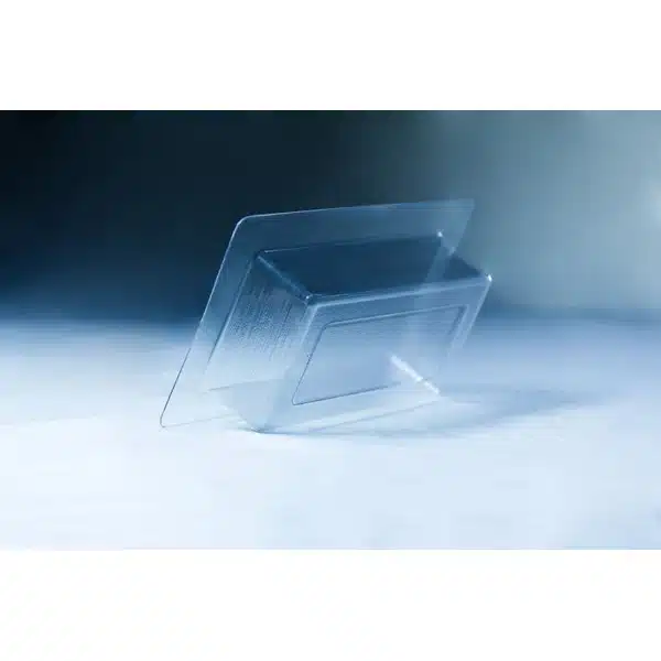 A clear plastic blister pack for the Mycelium Mould Growth form - Brick (Reusable) is angled on a light blue surface.