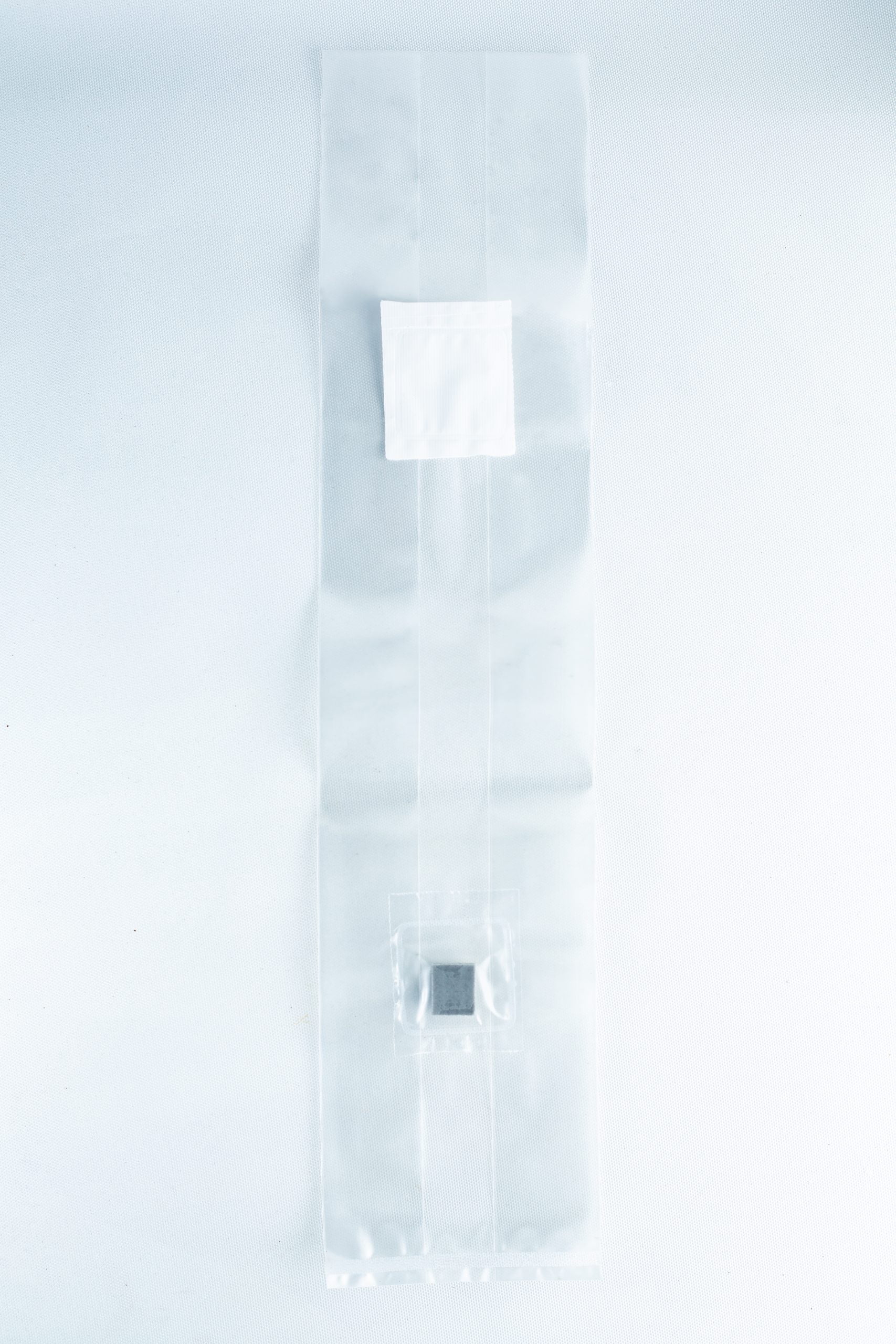 Unicorn Mushroom Grow Bags for spawn and substrate 5 The Mushroom Grow Bags Unicorn for spawn and substrate is a clear plastic bag with a white label and a small dark square inside, perfect for mushroom cultivation, shown on a white background.