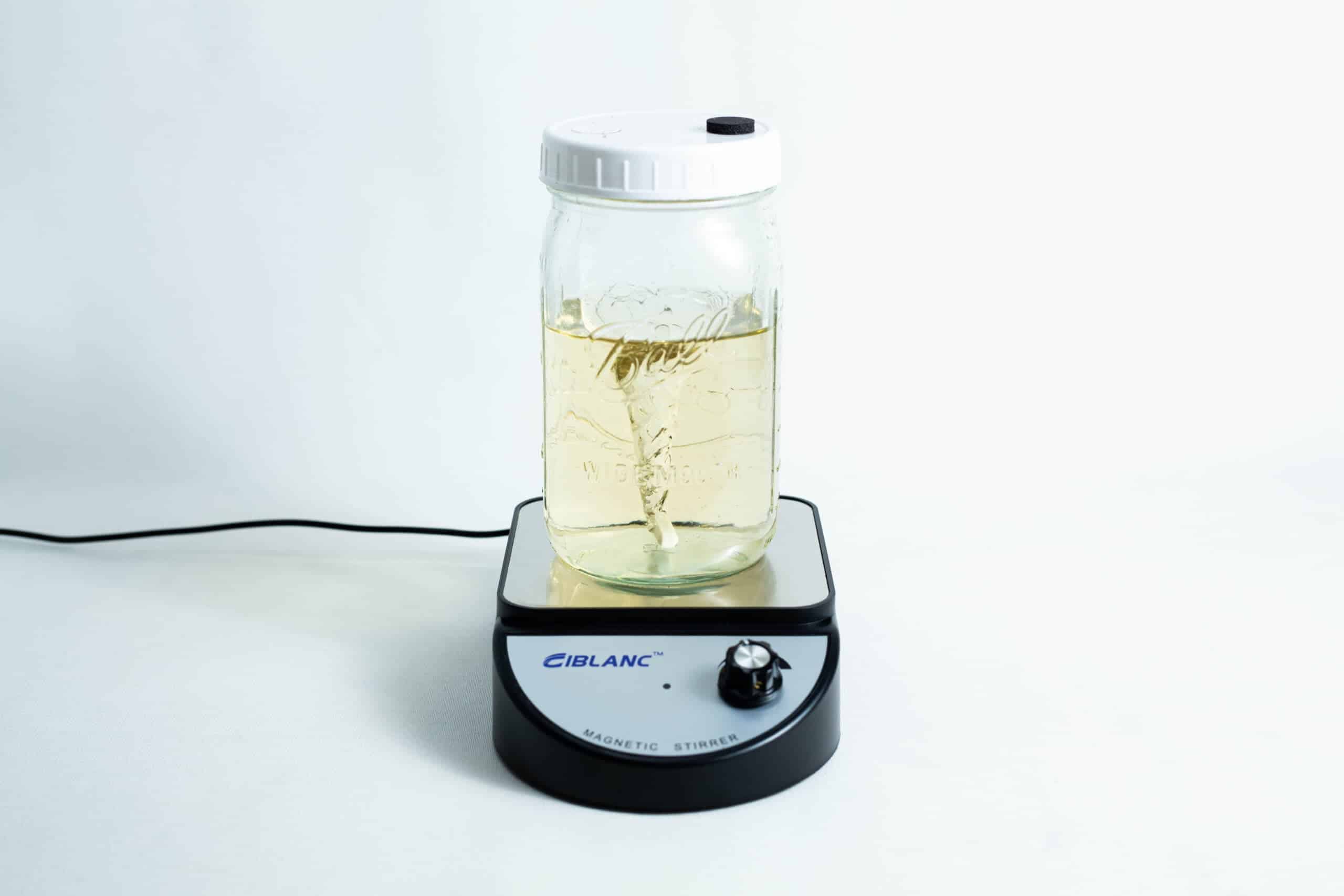 Magnetic Stirrer Ciblanc 3500rpm 6 A jar of liquid is being mixed on a Magnetic Stirrer Ciblanc 3500rpm, shown against a plain white background.