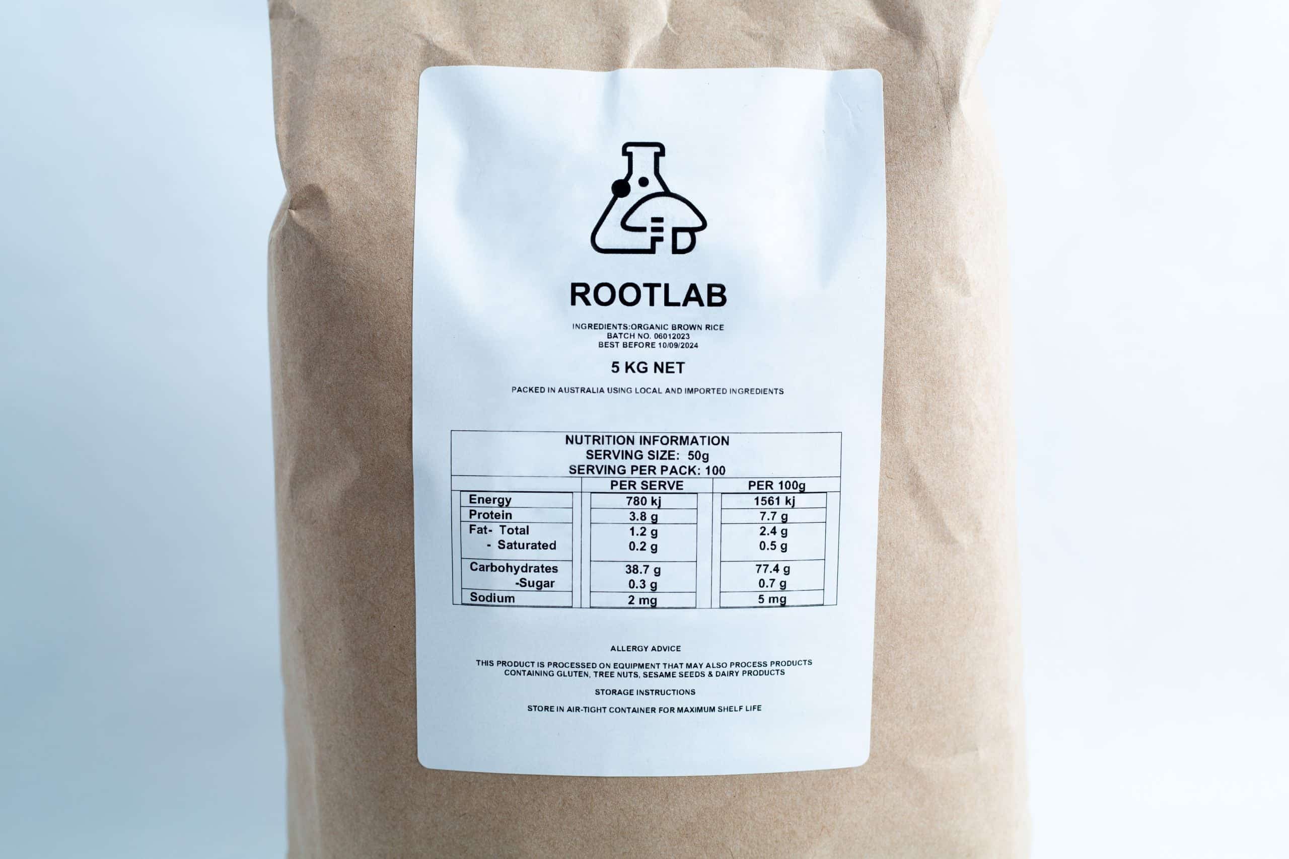 Brown Rice Flour 5kg Organic Food Grade 2 A brown paper bag labelled ROOTLAB with a nutrition information table, science beaker logo, and "Brown Rice Flour 5kg Organic Food Grade" printed on the front.
