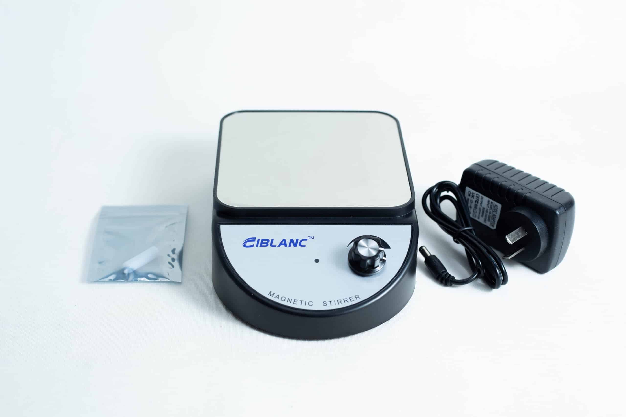 Magnetic Stirrer Ciblanc 3500rpm 1 The Magnetic Stirrer Ciblanc 3500rpm, featuring a control knob, power adaptor, and accessory packet, is displayed on a white background—perfect for those seeking to purchase or upgrade their stirring machine.