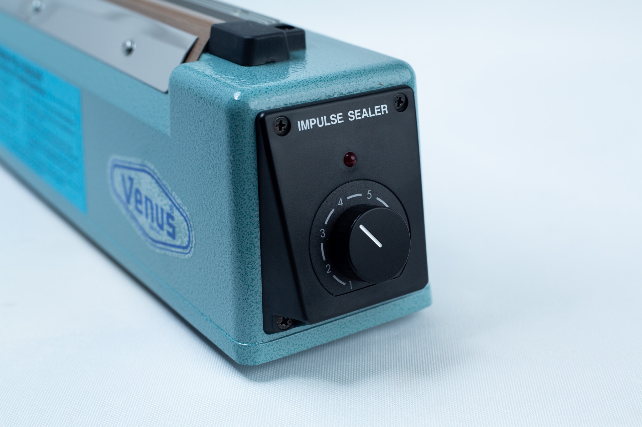 Heat Sealer 30cm Seal Width 5mm with cutter 3 A close-up of the Heat Sealer 30cm Seal Width 5mm with cutter showcases the precision and durability of this essential machine.