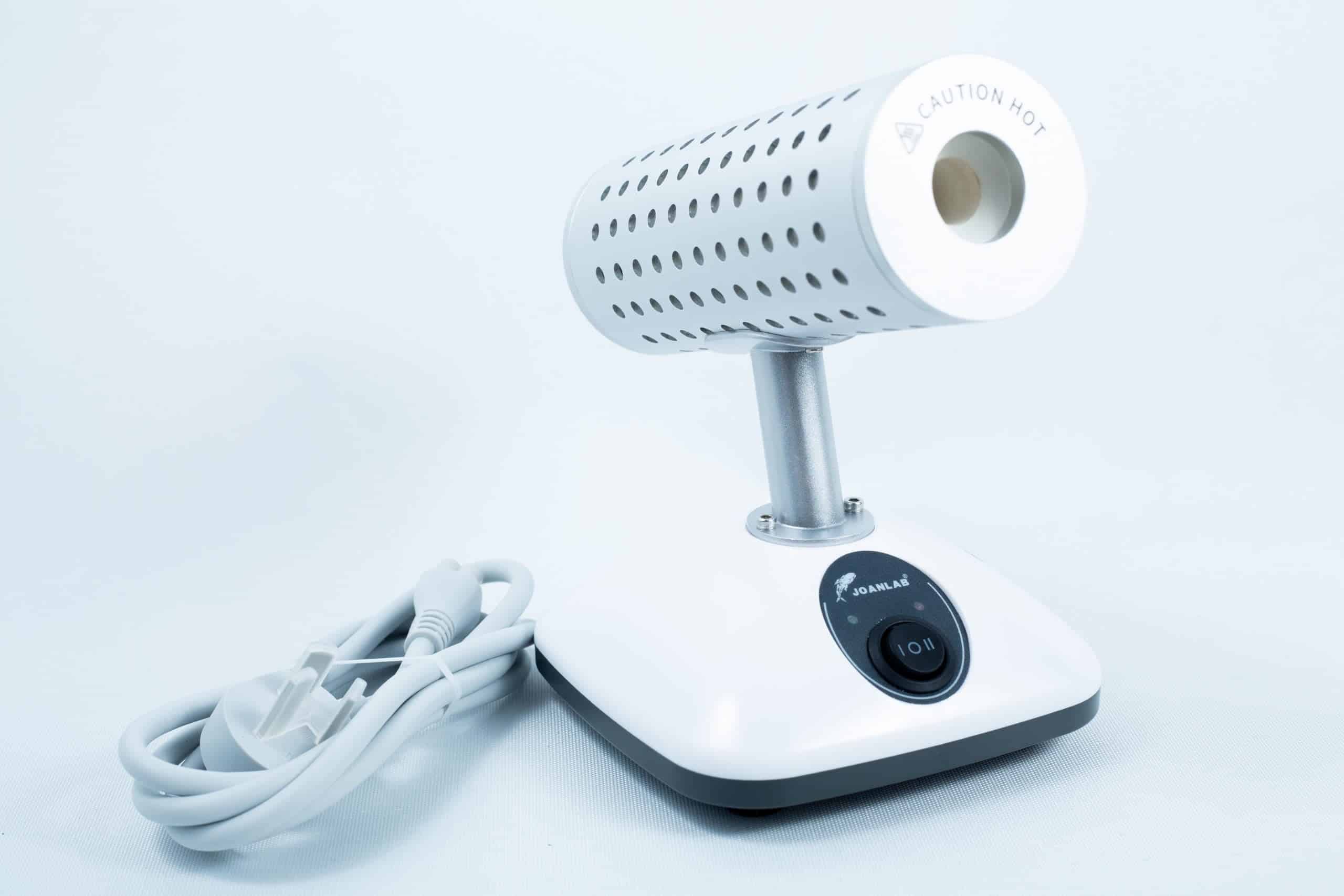 Infrared Sterilizer Bacti Cinerator Lab tool 1 The Infrared Steriliser Bacti Cinerator Lab tool features a white base, power switch, and attached lead, providing efficient sterilisation for laboratory instruments.