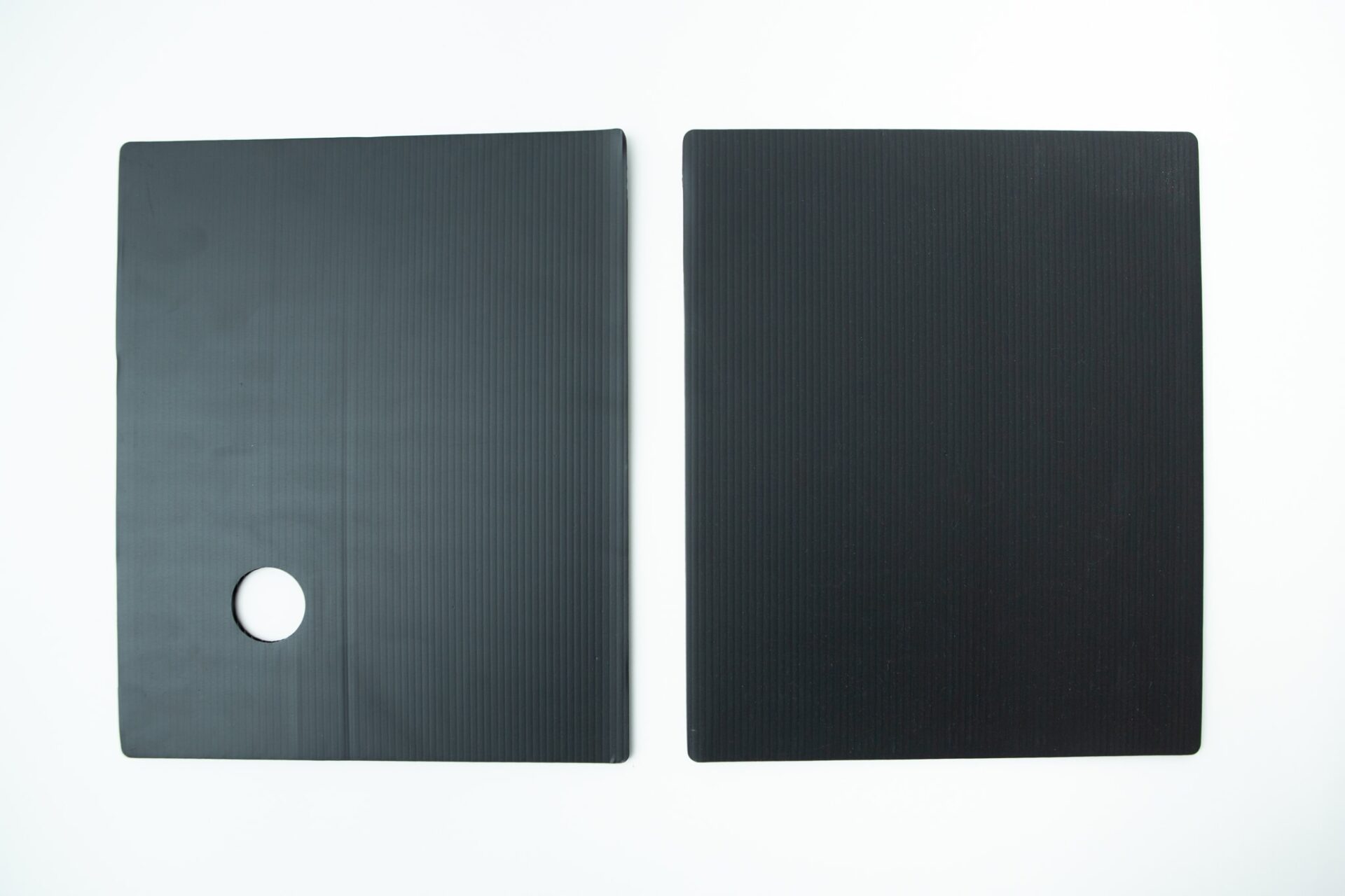 Inflatable monotub kit for Growing mushrooms- Boomer Shroomer V 2.0 13 Two black rectangular mats, one with a circular hole, placed side by side on a white background—perfect for use with the Inflatable Monotub Kit for Growing Mushrooms - Boomer Shroomer V 2.0.