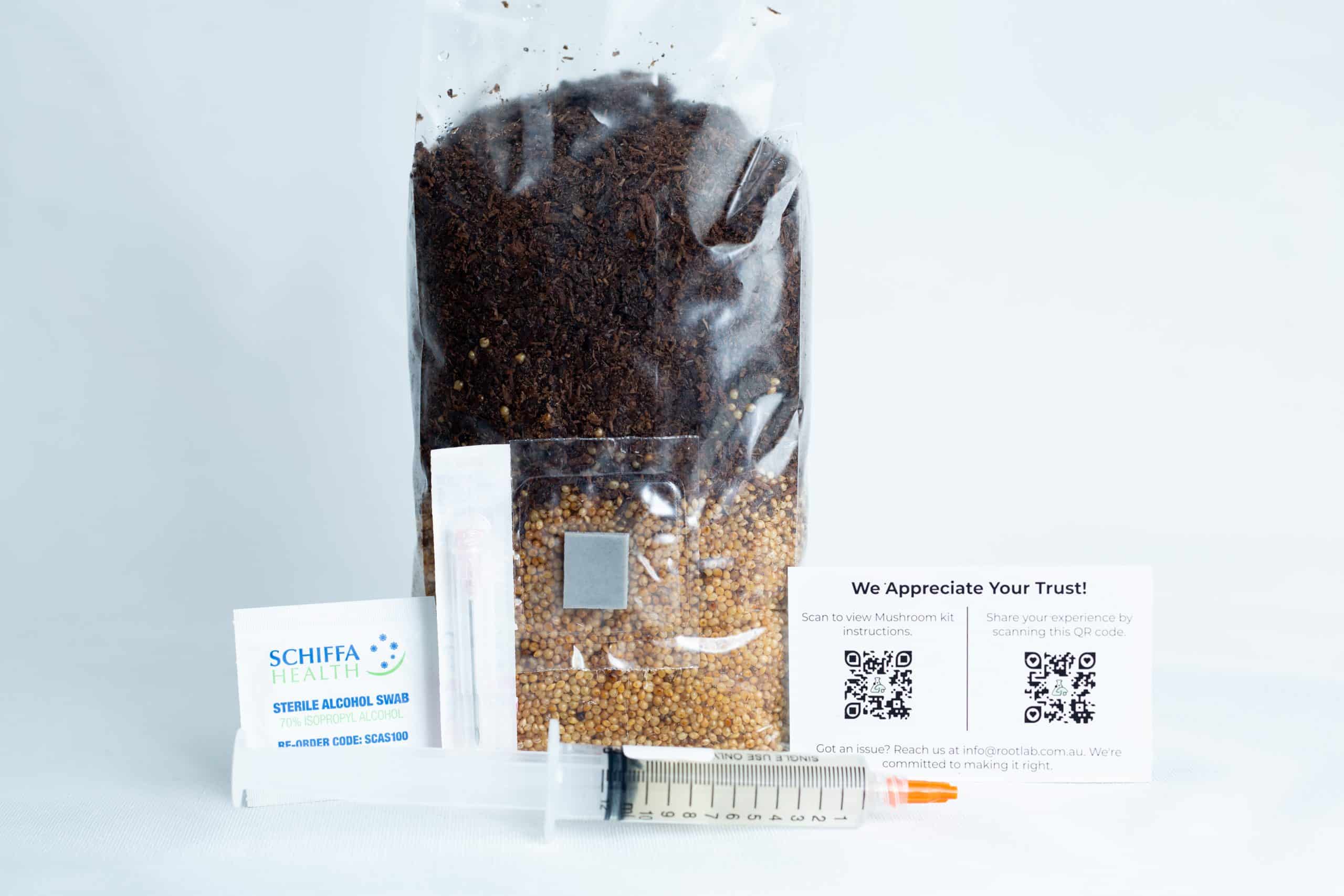 Black King Oyster Mushroom Grow Kit 2 The Black King Oyster Mushroom Grow Kit includes a sealed seed bag, syringe, alcohol swab, and two QR code cards, all shown on a white background.