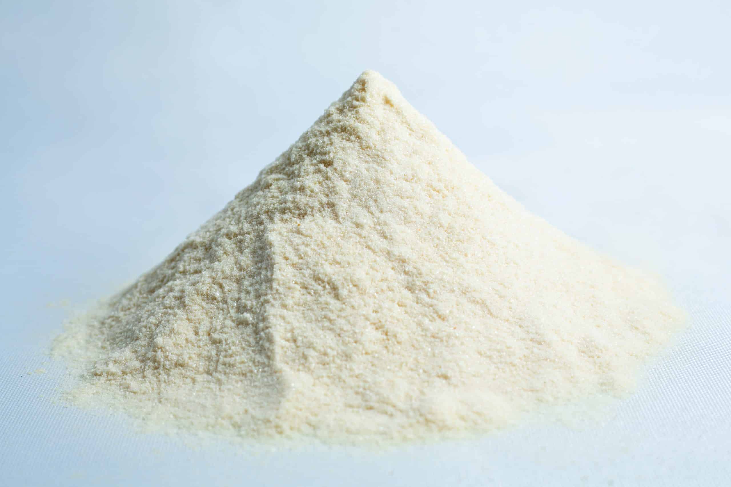Malt Extract Agar (MEA) premix 2 A small mound of fine, off-white powder—Agar Mix MYAG Antibacterial Malt Extract Yeast—rests on a light surface.