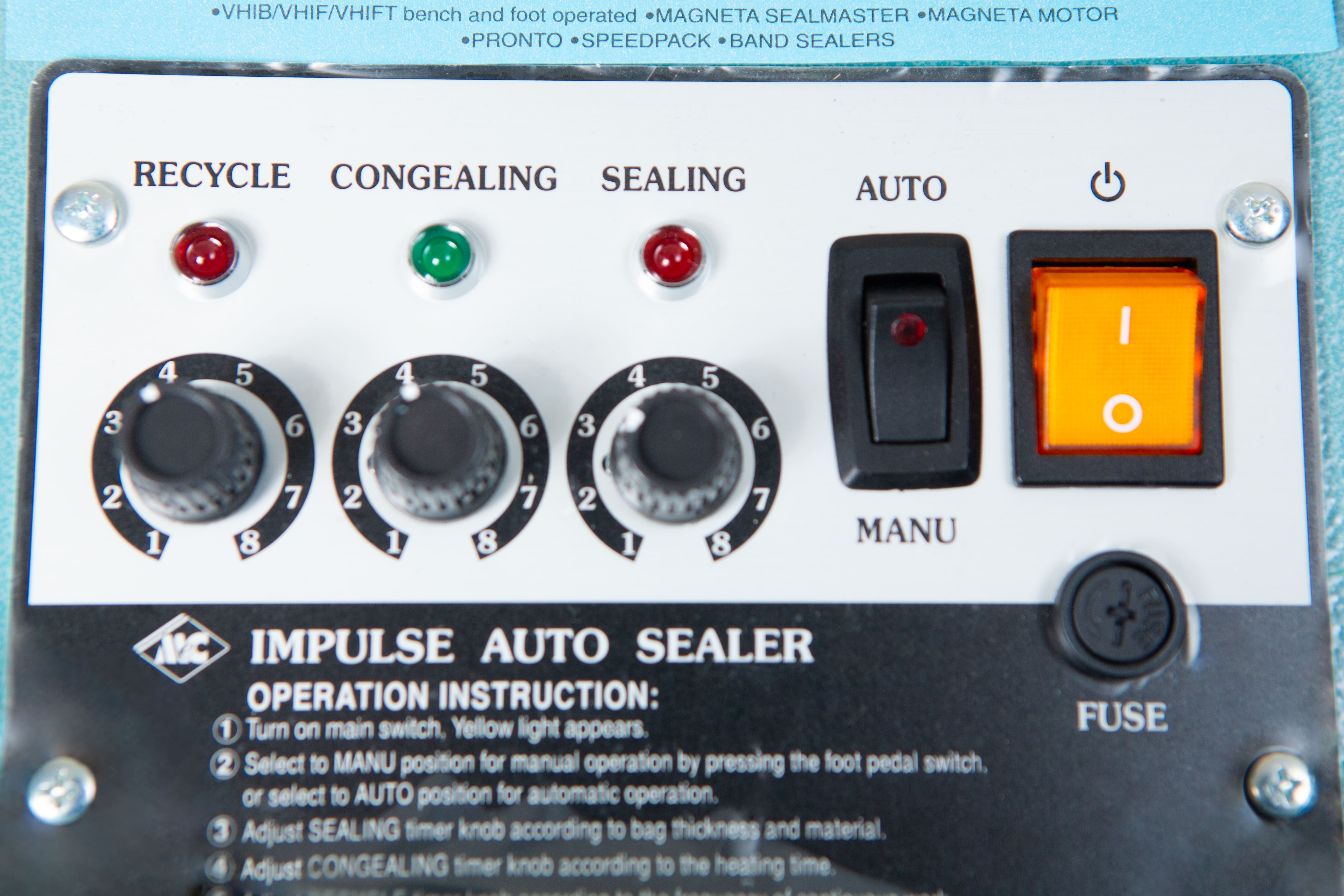Heat Sealer 450mm with 10mm Seal | Benchtop Model 3 Close-up of the Heat Sealer 450mm with 10mm Seal | Benchtop Model control panel, featuring knobs, buttons, and an orange power switch.