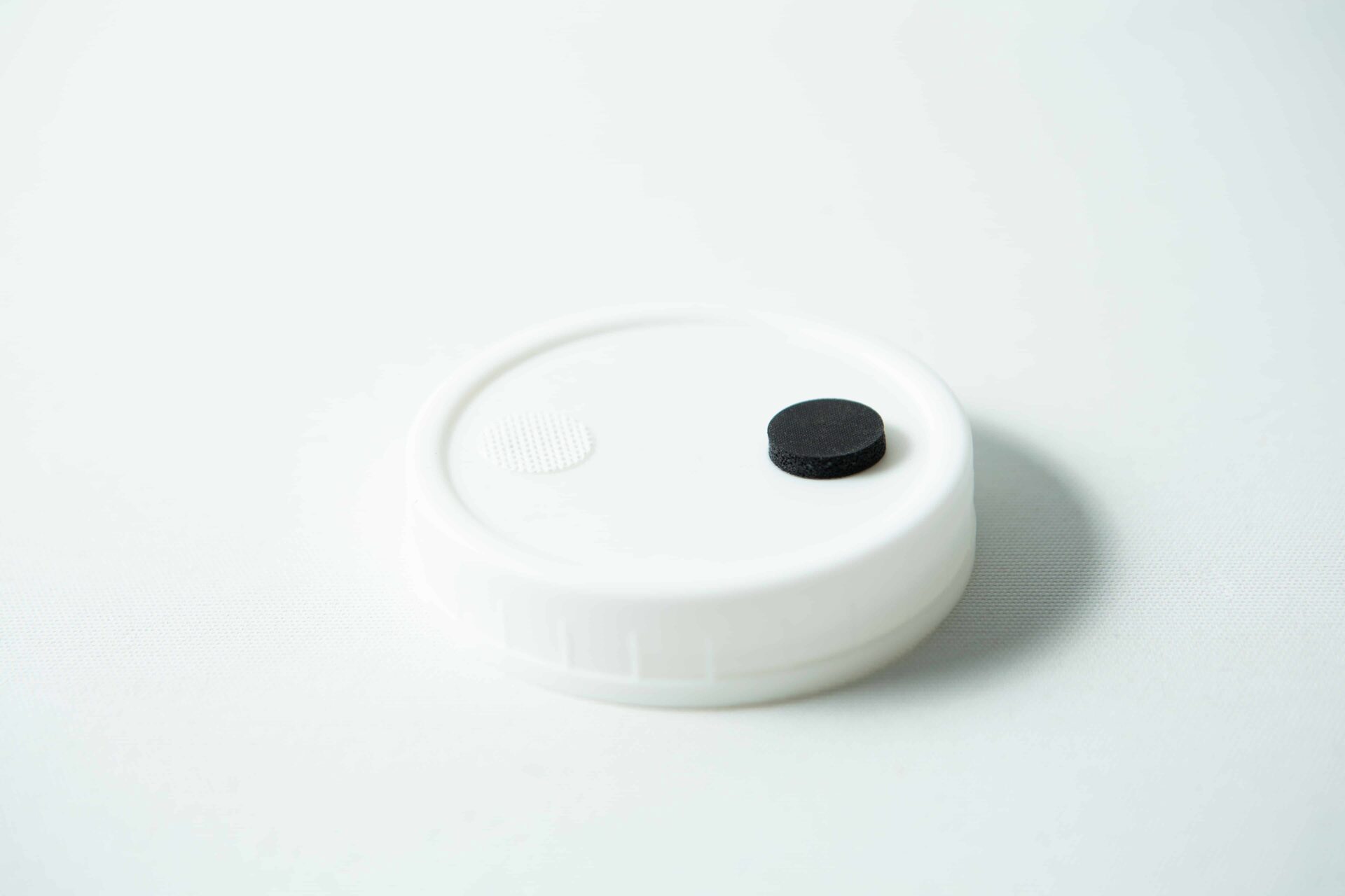 Mycology premade Wide Mouth Mason Jar Lids white with inj port and air filter 7 The Mycology pre-made Wide Mouth Mason Jar Lid in white features an injection port and air filter, making it ideal for autoclaving and mycology use.