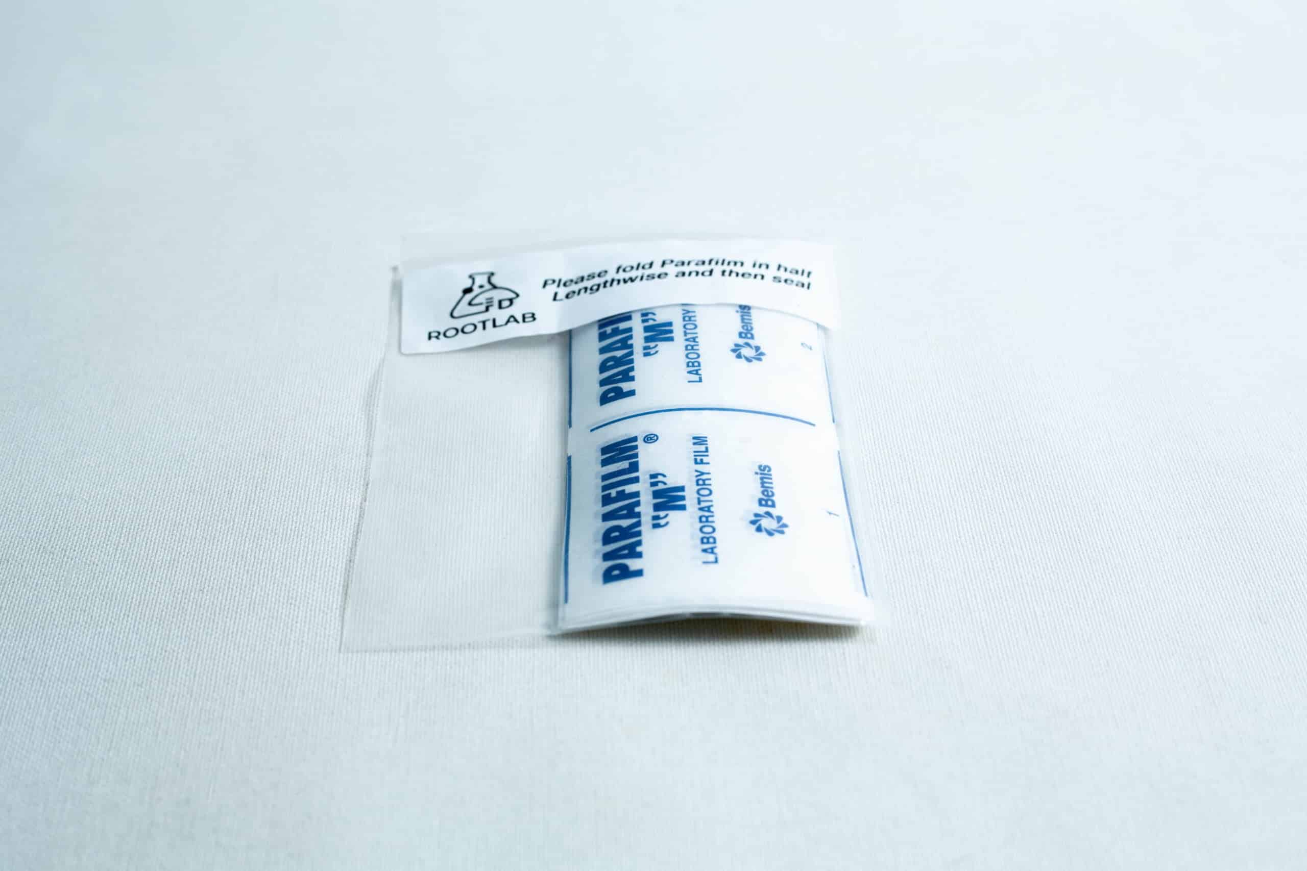 Pre-cut parafilm strips 10x Lab cut film 1 A packet of Pre-cut Parafilm strips 10x Lab cut film in clear packaging displayed on a white surface.