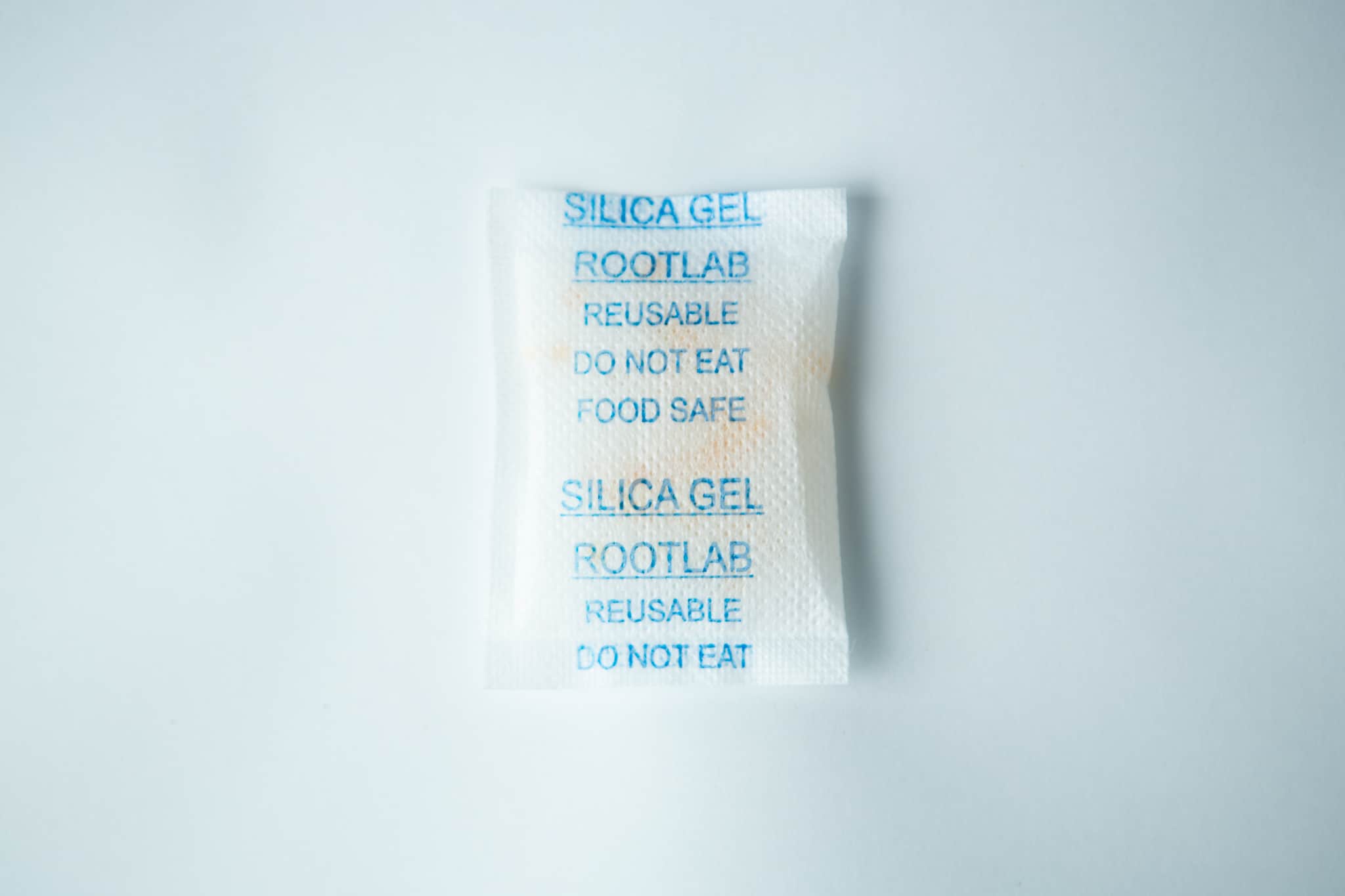 Desiccant Silica Gel 5gm | Reusable 3 A white Desiccant Silica Gel 5g | Reusable packet labelled DO NOT EAT and FOOD SAFE on a plain white background.