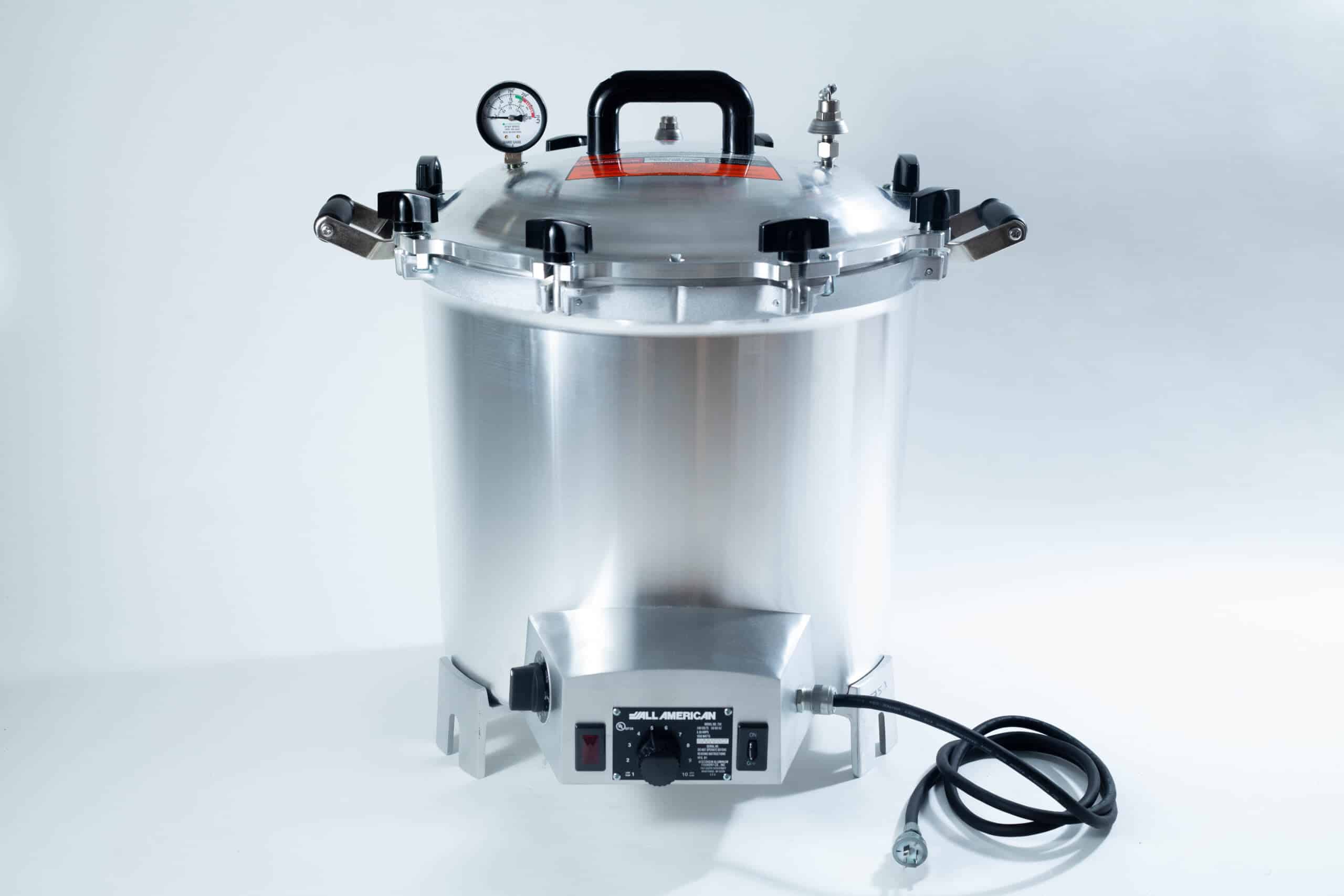 All American 4180 Support Base for 75X Sterilizers 3 A stainless steel electric pressure cooker with a gauge, handle, and attached power lead.