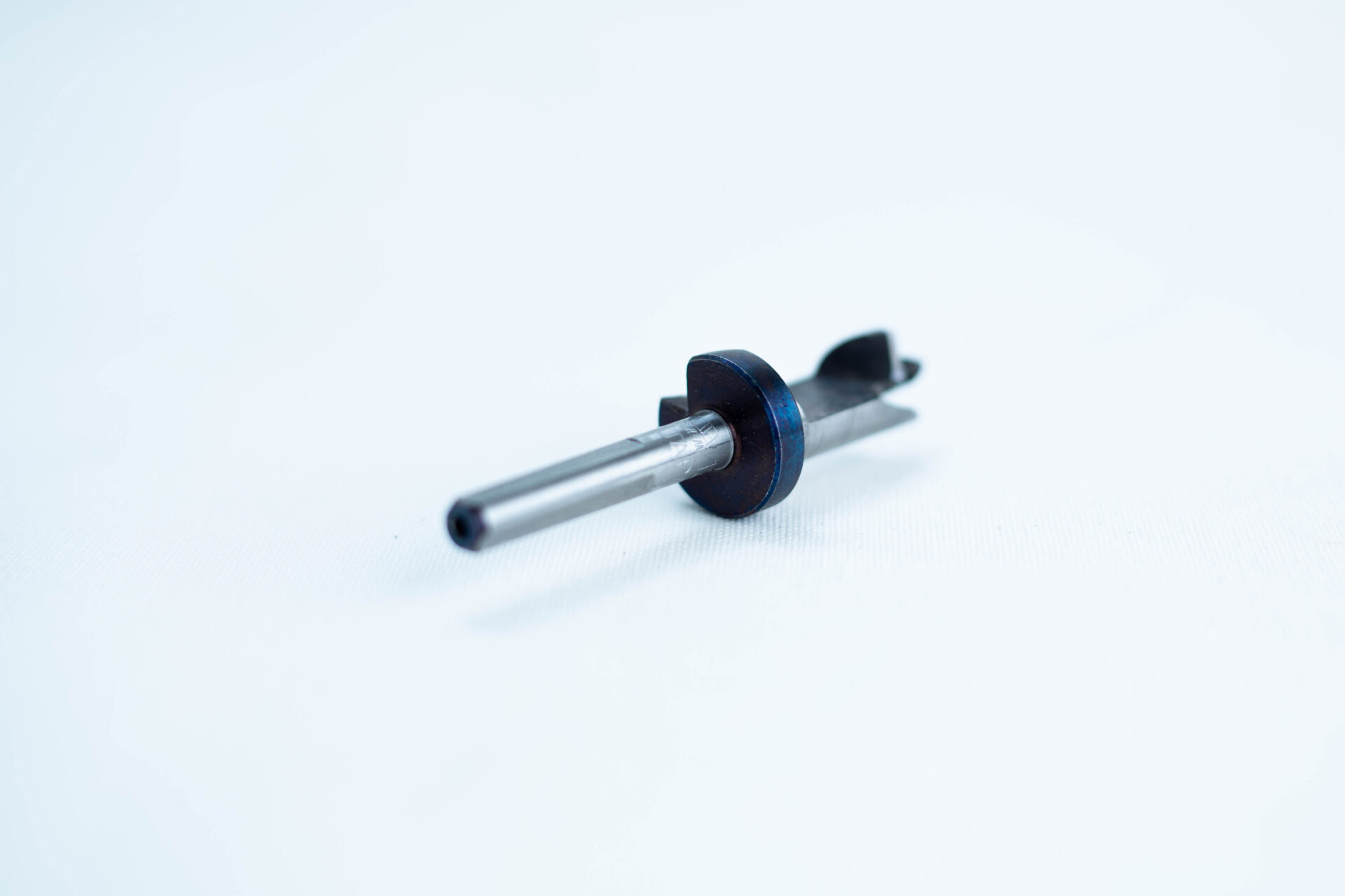 12.5 mm Sawdust Inoculation Drill Bit With Stopper, Hex Shank 2 A small metal and plastic mechanical part on a white background.
