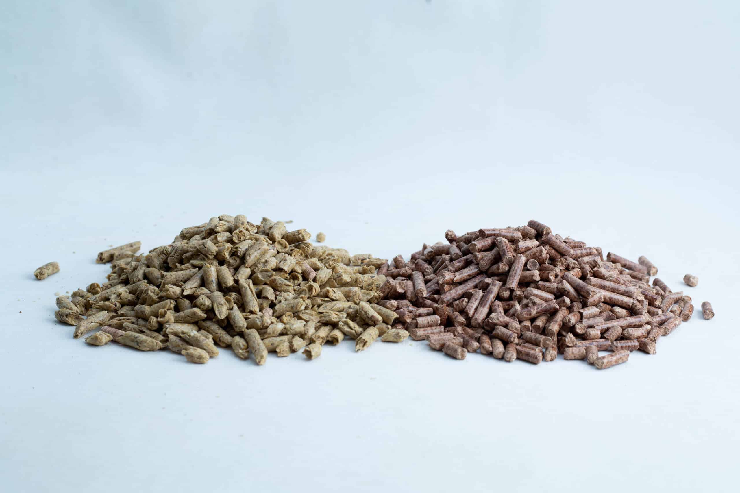 Masters Mix | Blend of Hardwood and Soy Hull Pellets with Gypsum Substrate (Dry)|5Kg 1 Two piles of brown and beige animal feed pellets on a white background.