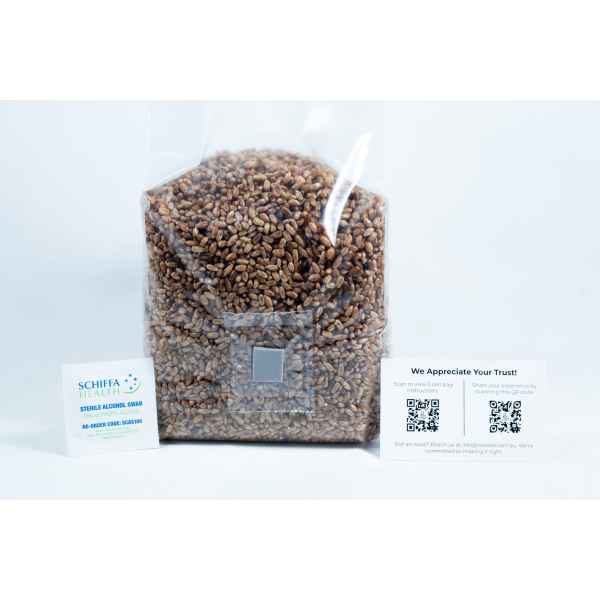A bag of rye grain organic pre-sterilised for mushroom cultivation with injection port and air filter is placed between a business card and an appreciation card with QR codes, all on a white background.