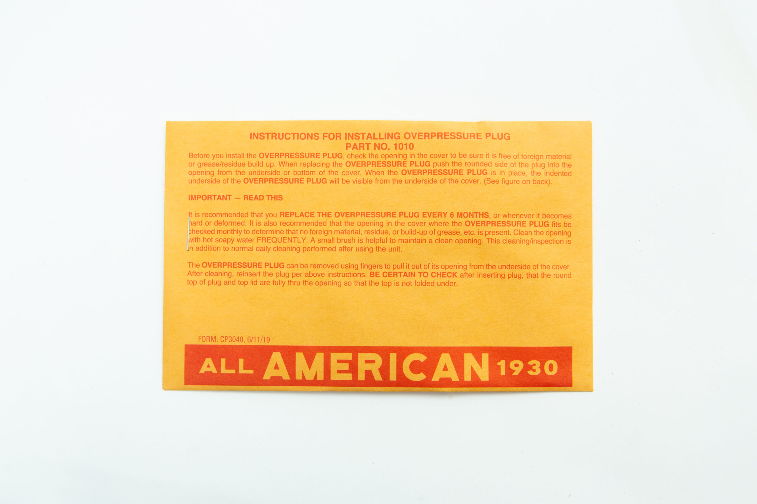 All American rubber overpressure plug for sterilizer | Orange | Part 1010 3 Orange instruction card titled "All American 1930" provides installation steps for the All American rubber overpressure plug for steriliser (Part 1010), an essential safety part designed for reliable pressure control.