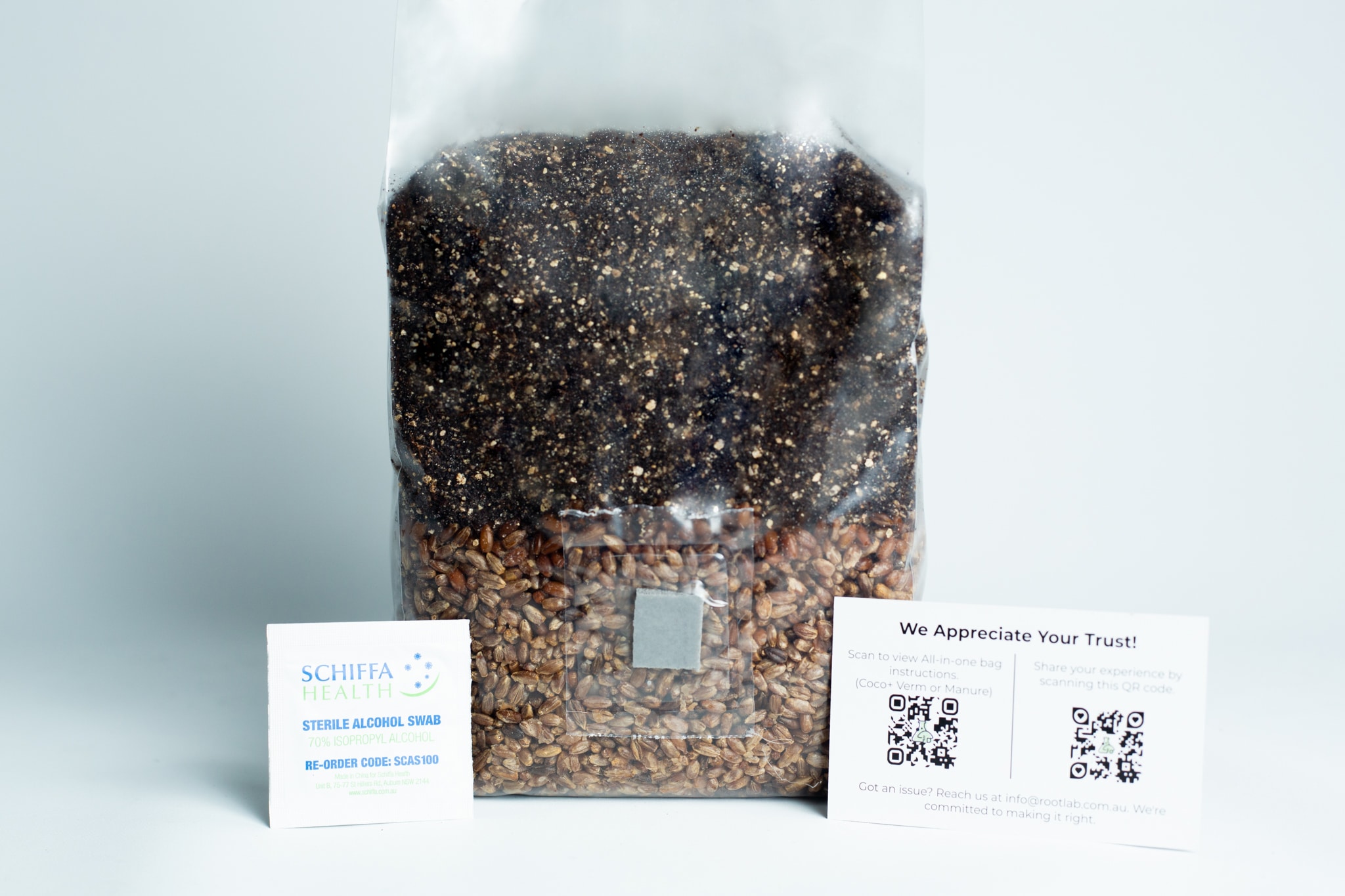 All in one Coco Coir+Vermiculite | organic rye | Millet | 1kg | 2kg Mushroom bag | Instruction 7 A clear bag of grains with two information cards beside it on a white surface.