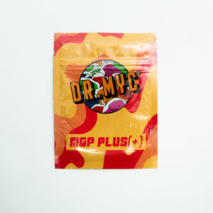 A vibrant packet of DRMyc Adaptive Liquid Culture Premix features a mushroom graphic on yellow and red, emphasising its adaptive formula.