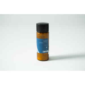 A small brown bottle with a blue label reading "Plant Cell Gibberellic Acid (GA3) Powder" sits on a white surface.