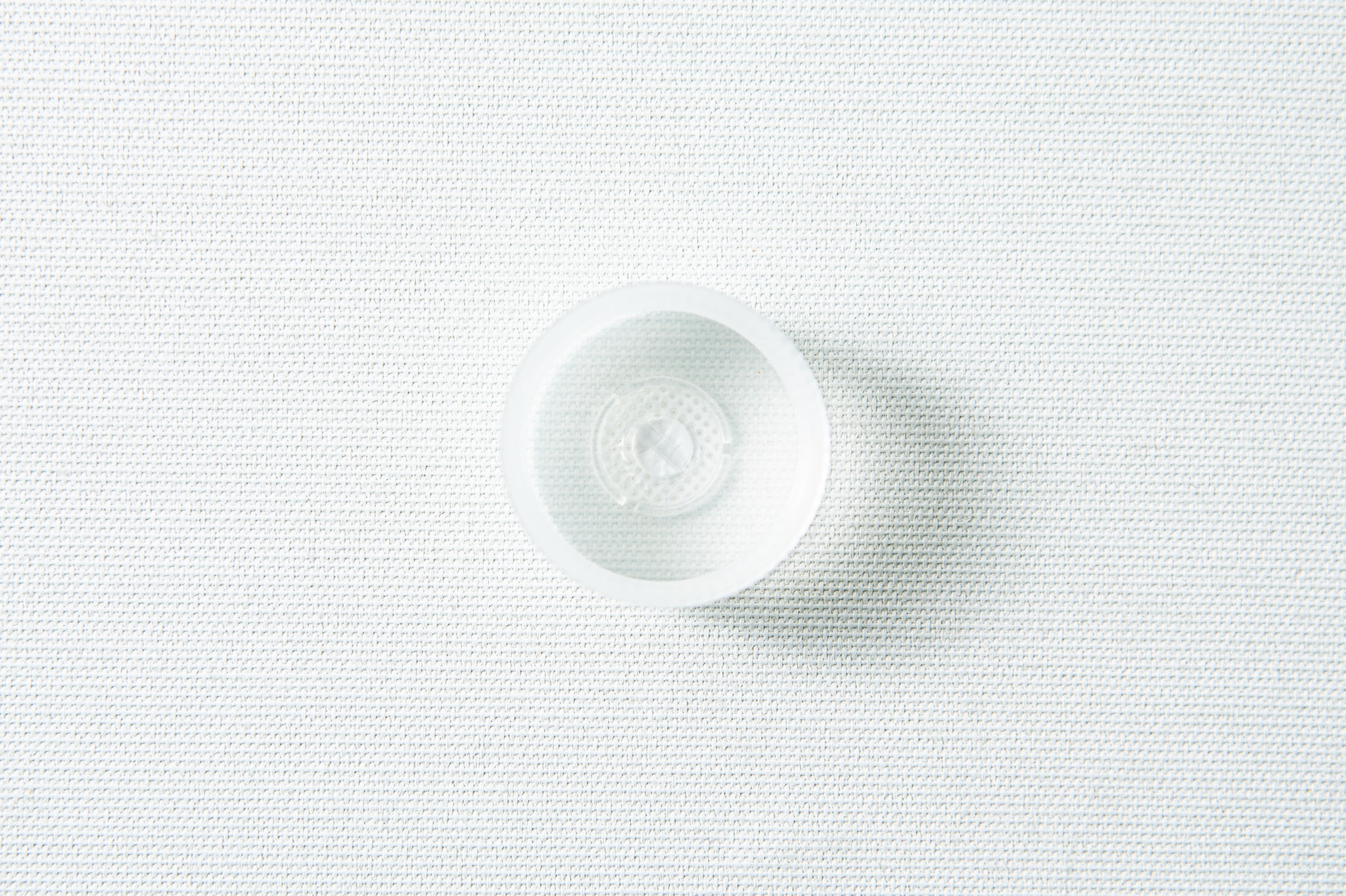Plant Cell Vented Plant TC Test Tubes with rack 12pc 3 The Plant Cell Vented Plant TC Test Tubes with rack 12pc set shown from above, featuring a clear suction cup on a white textured surface.