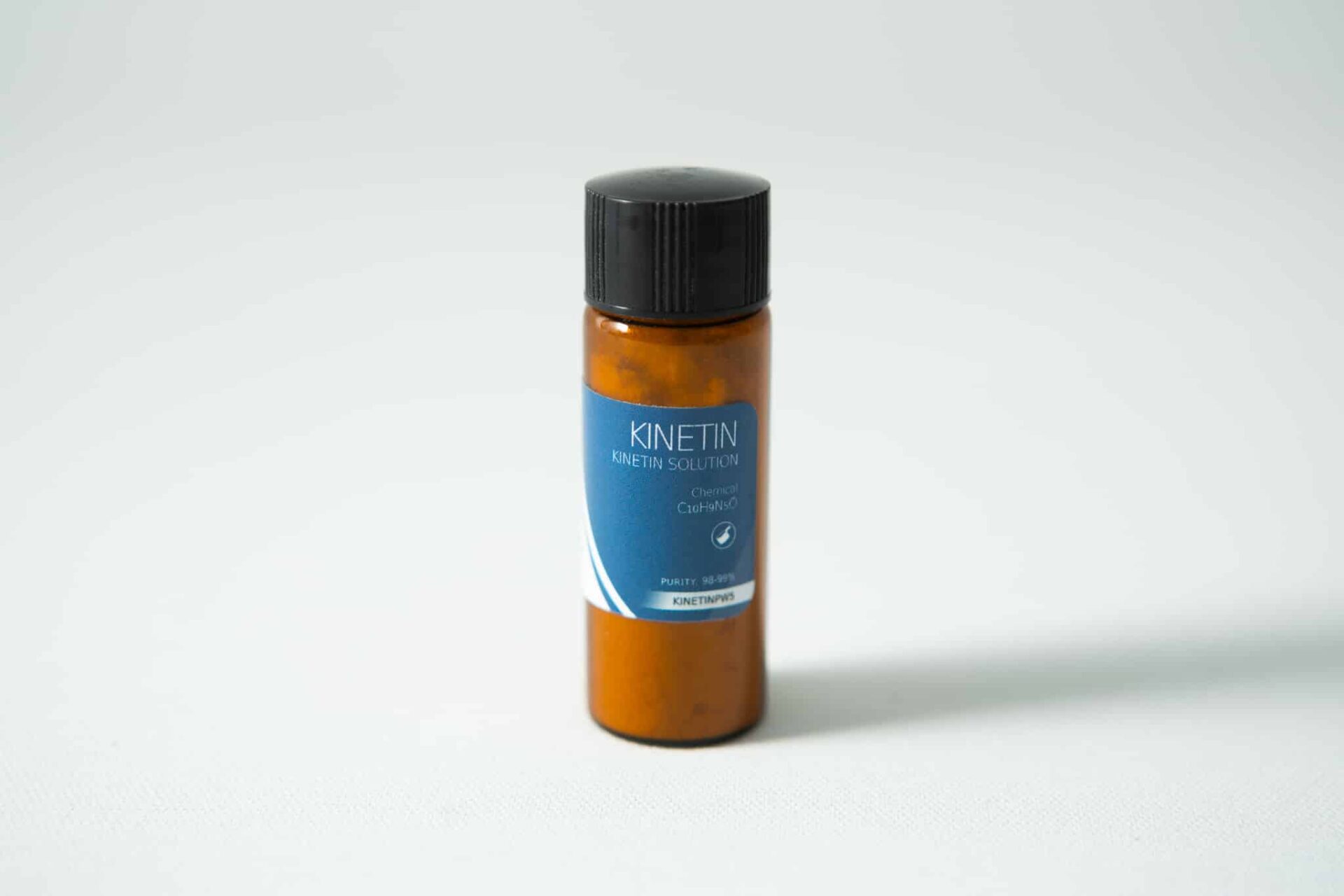 Plant Cell Kinetin Powder 1 Brown bottle with black cap and blue label reading “Plant Cell Kinetin Powder” on a plain light background.