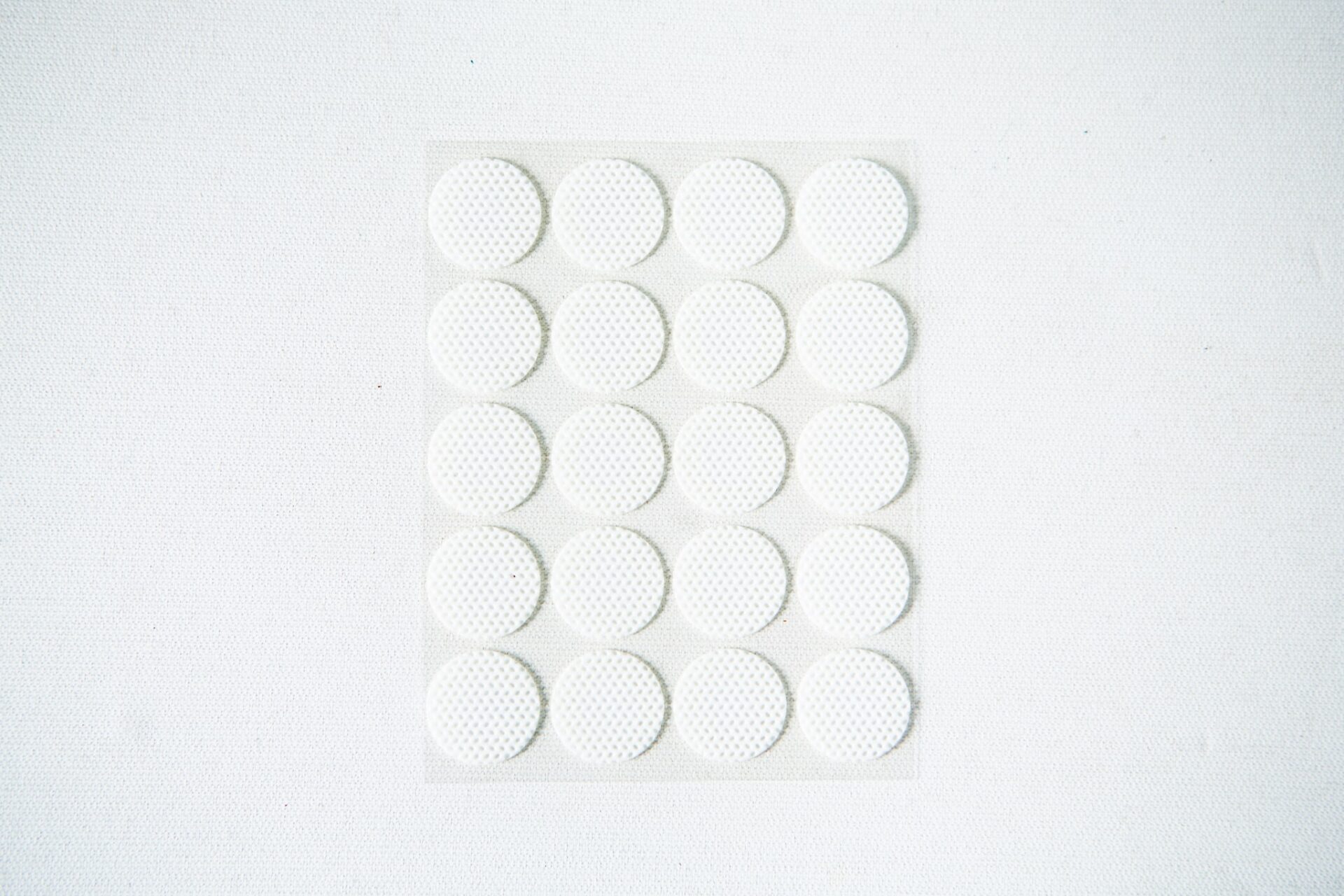 Self-healing injection port & Air Vent Filter-3M 10 A sheet of 18 round, white adhesive labels arranged in a grid on a white background.