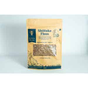 Home 16 A brown bag labelled "Shiitake Mushroom Floss | Vegan" with a clear window displays the shredded contents inside.
