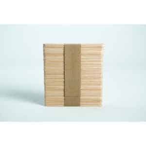 A bundle of ice lolly sticks, neatly wrapped with a brown paper band, is set against a white background.