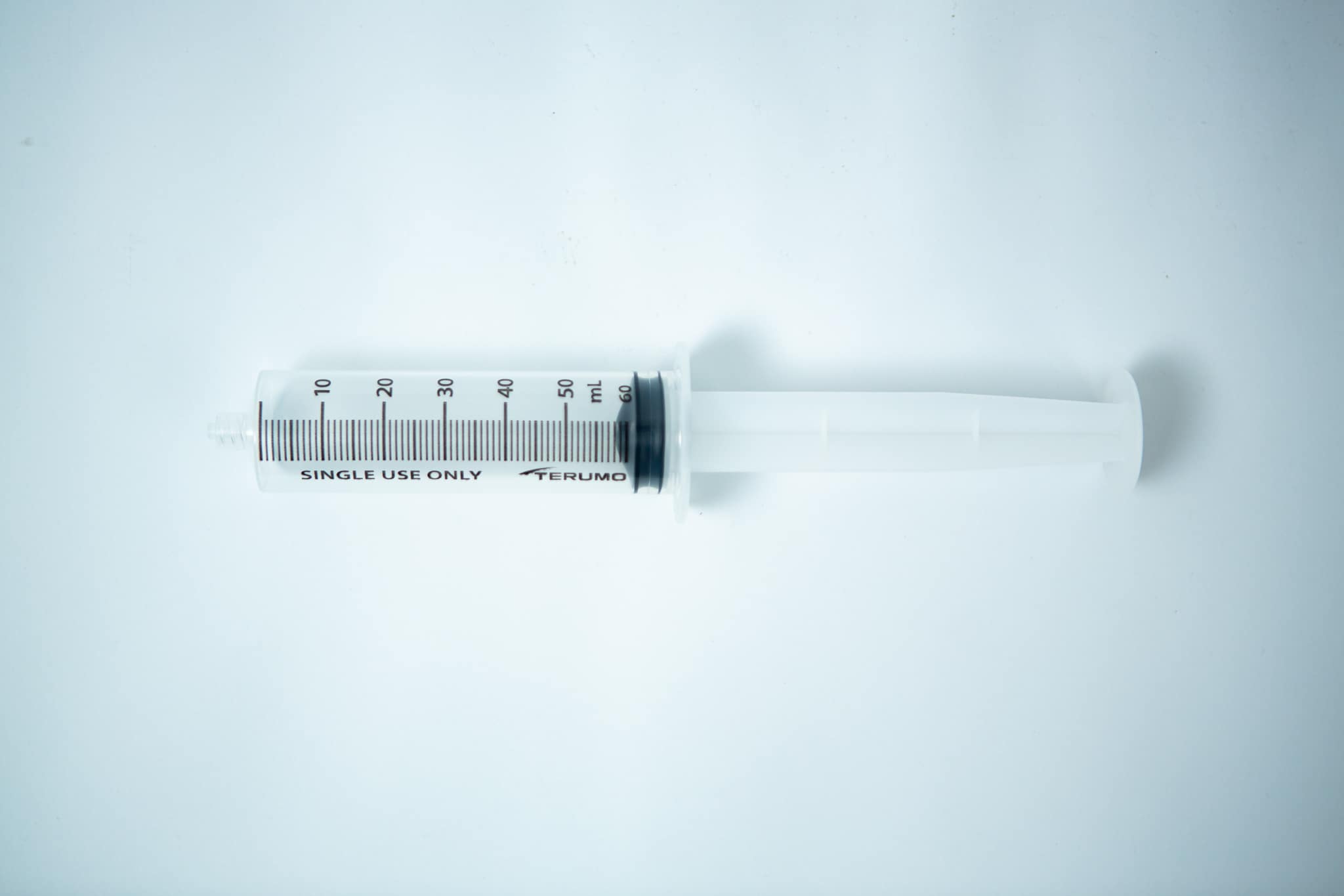 Syringes Luer lock with Hypodermic Needle and syringe Cap set 3 A large, empty plastic Syringes Luer lock with Hypodermic Needle and syringe Cap set labelled "single use only" on a white background—ideal for those seeking to buy syringes or browse syringes for sale online.