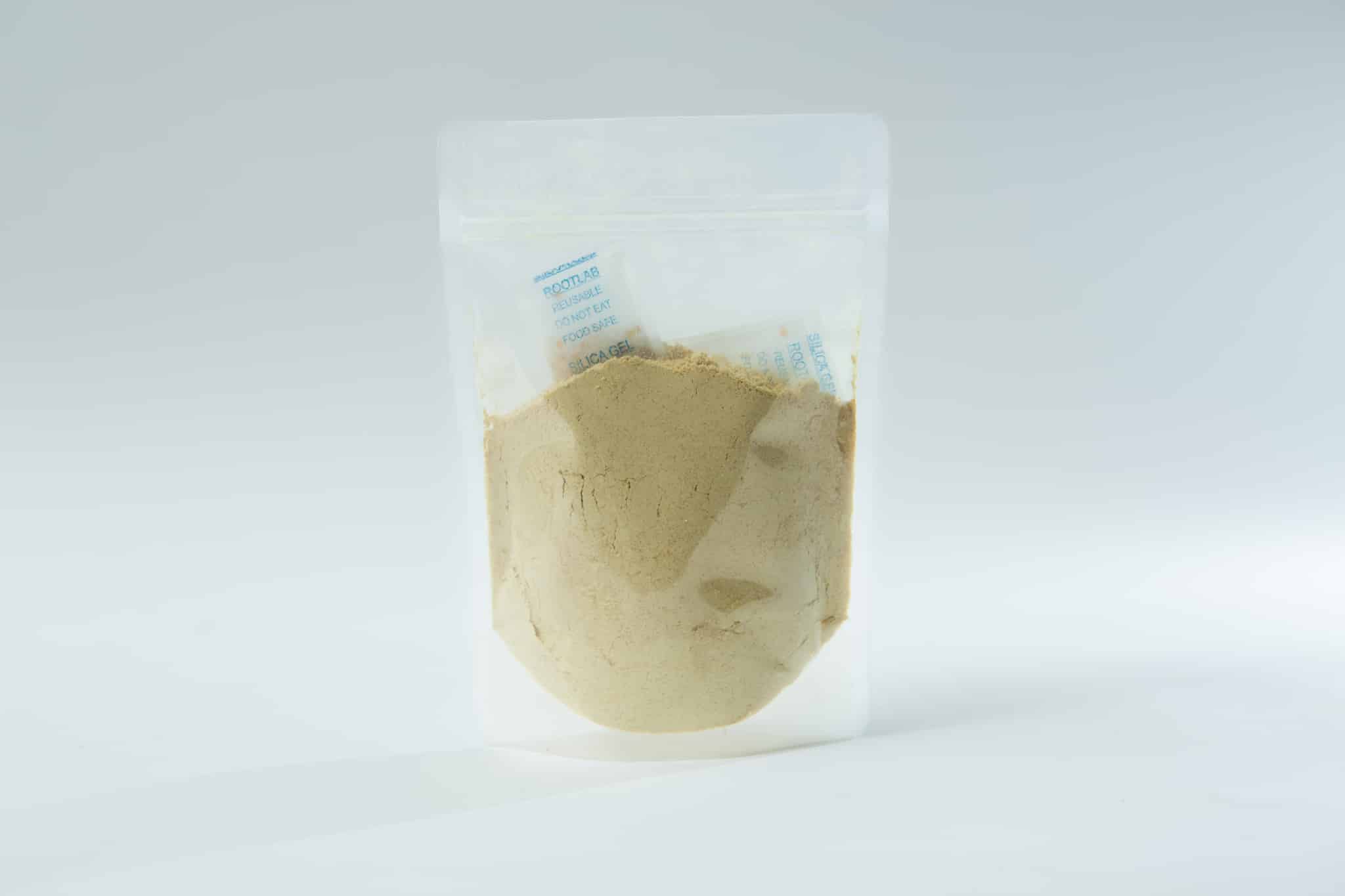 Lions Mane Mushroom Powder 100% Australian grown 100% fruiting body! 1 A clear plastic pouch containing light brown Freeze-Dried/ Dehydrated Mushroom Lion's Mane powder with a small silica gel sachet inside.