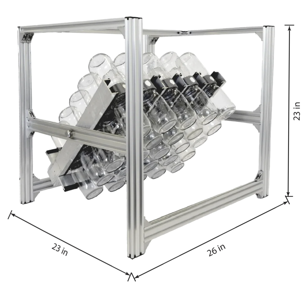 A metal laboratory bottle roller rack holds multiple glass bottles at an angle.