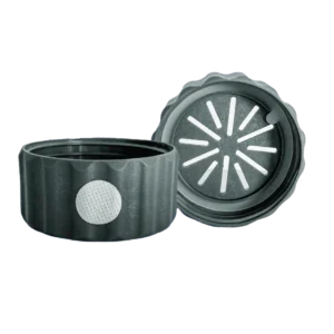 Two-piece black plastic grinder with a textured grip and slotted teeth, shown open on a white background.