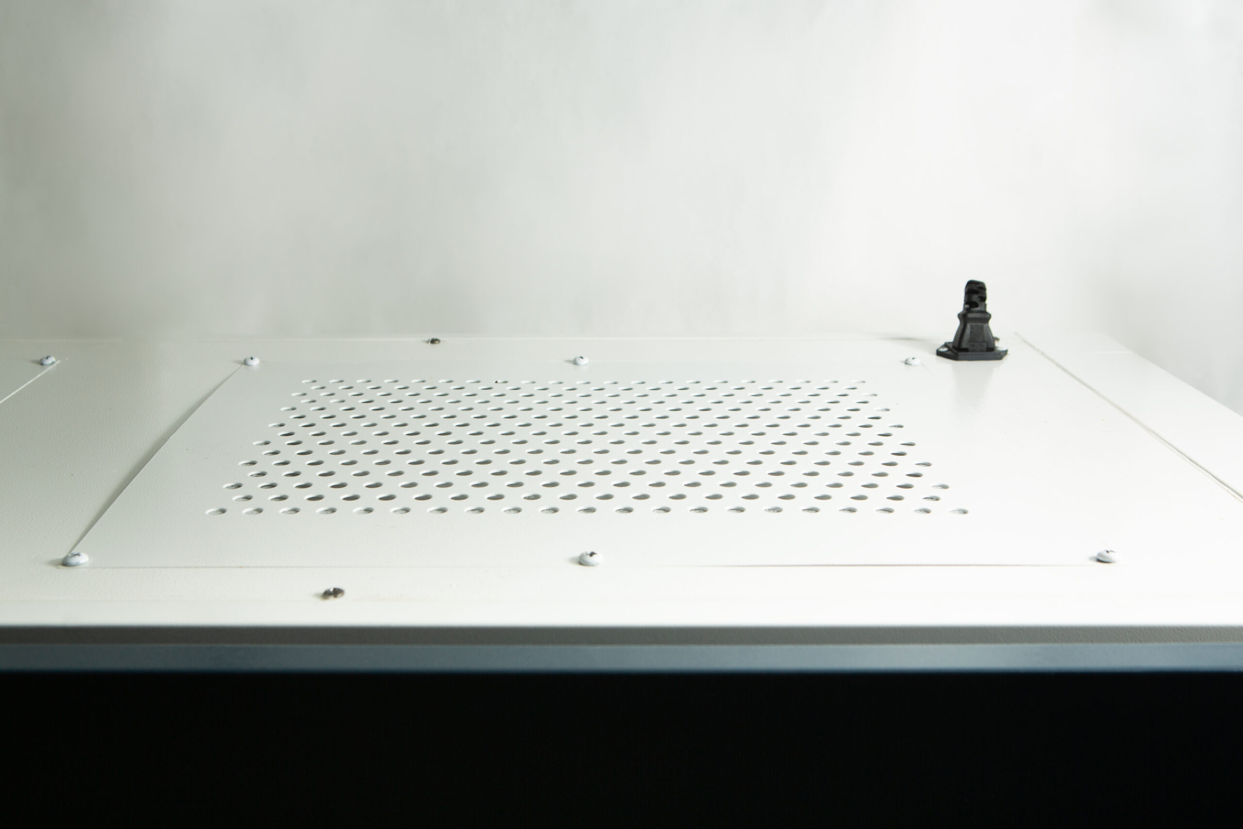 Horizontal Laminar Flowhood Cabinet | Clean bench 6 A small Darth Vader figurine stands on a white surface with ventilation holes.